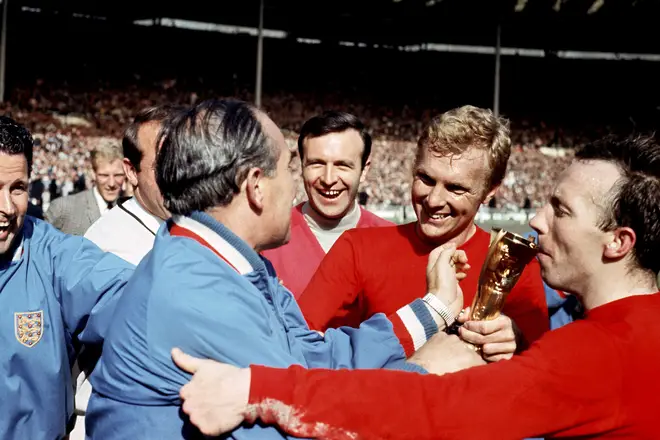 Stiles (far right) kissing the Jules Rimet trophy after winning the World Cup with England