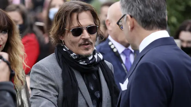 A judge found the report in the Sun labelling Depp a wife beater was 'substantially true'