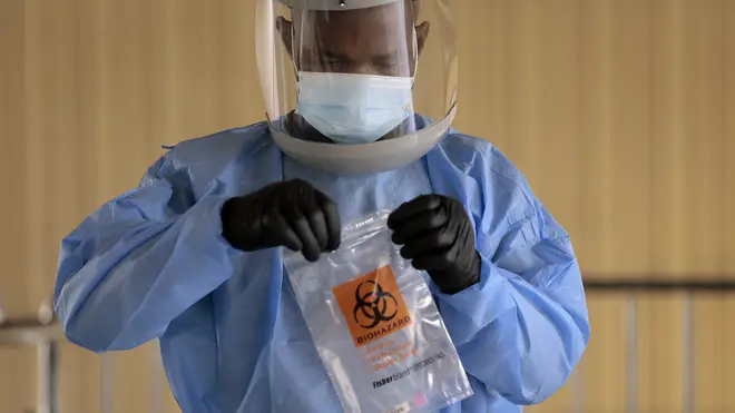 A test is sealed in a biohazard bag