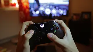 Person using an Xbox