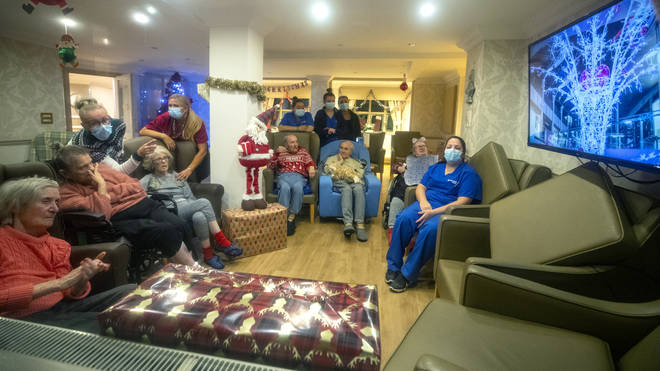 File photo: Residents and care workers at Churchview Nursing Home in Liverpool watch a video of this year's christmas lights switch on in Liverpool city centre