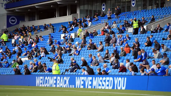 Some football fans were allowed to return to watch Brighton play Chelsea as part of a pilot event in August