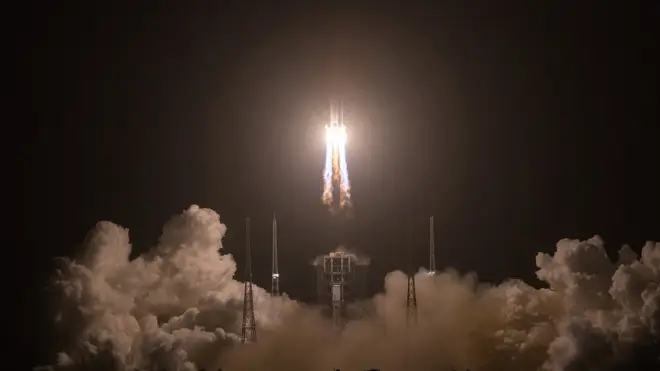 A Long March-5 rocket, carrying the Chang'e-5 spacecraft, blasts off from the Wenchang Spacecraft Launch Site
