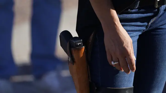 Lauren Boebert, the Republican candidate, with a gun in her holster (David Zalubowski/AP)