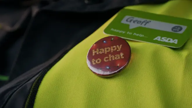 A badge which reads 'Happy to chat' that Asda delivery drivers can wear on their uniforms to help combat loneliness
