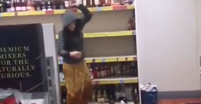 The woman was told to "calm down" by other customers