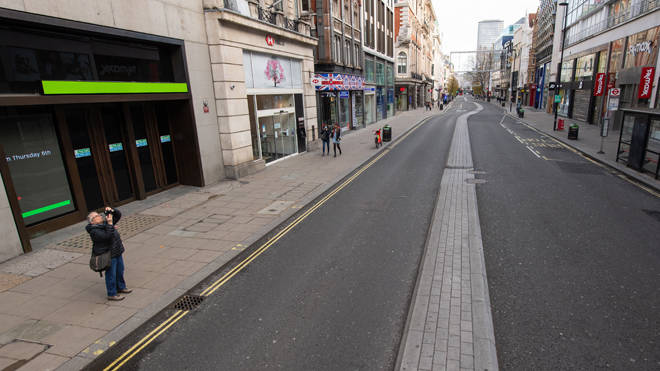 A deserted Oxford Street in London during lockdown, but shops can reopen today
