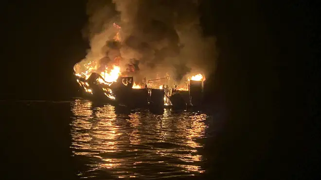 The dive boat Conception is engulfed in flames after a deadly fire broke out aboard the commercial scuba diving vessel off the Southern California Coast (Santa Barbara Fire Department/AP)
