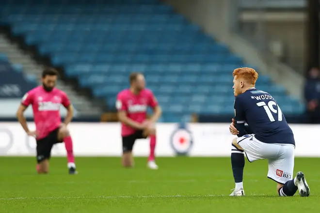 Millwall v Derby County fans booed as players took a knee
