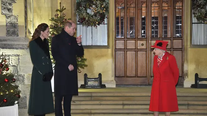 Queen Elizabeth with the Duke and Duchess of Cambridge