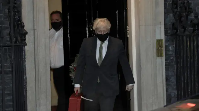 Boris Johnson pictured leaving for Brussels this evening