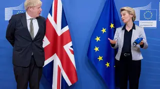 European Commission President Ursula von der Leyen (R) talks with British Prime Minister Boris Johnson