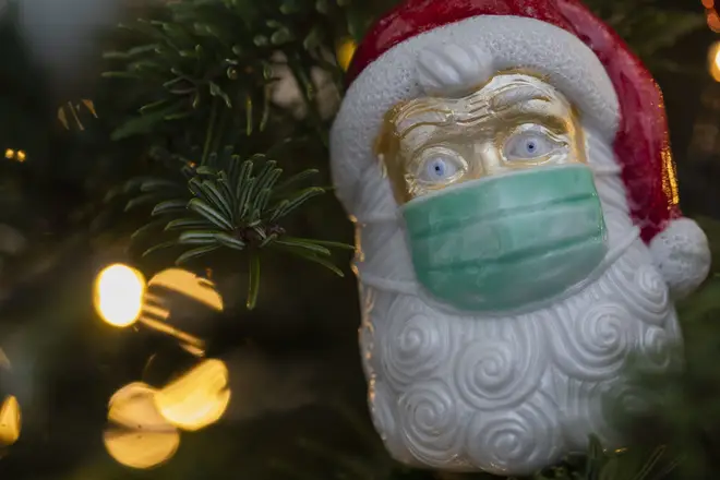 The WHO have called on people to "wear masks and maintain physical distancing" over Christmas.