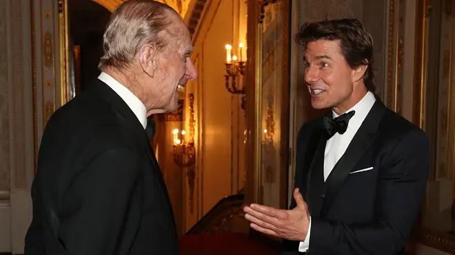 The Duke of Edinburgh meets Tom Cruise during a dinner at Buckingham Palace in London in 2017