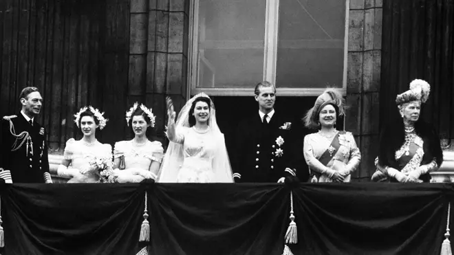 The royal wedding party appear on the balcony of Buckingham Palace after the wedding in 1947