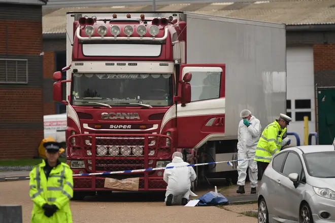 Police and forensic officers at the Waterglade Industrial Park in Grays, Essex, after 39 bodies of Vietnamese migrants were found inside the lorry
