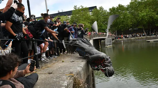 Protesters threw a statue of Edward Colston into Bristol harbour during a Black Lives Matter protest rally