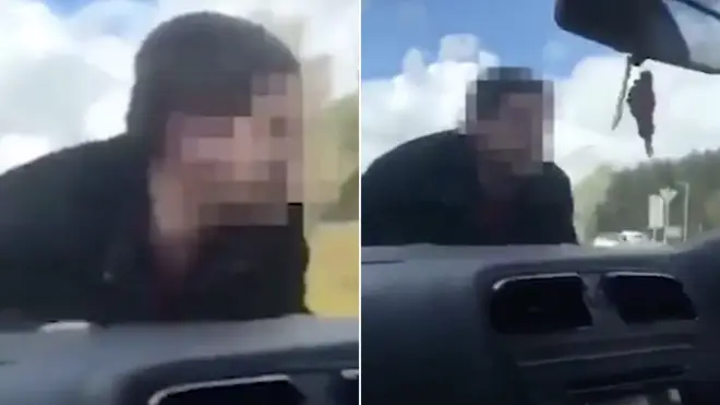 The man clings onto the car bonnet as the terrified driver screams