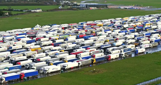 Freight lorries lined up in Manston, Kent, after French authorities announced that journeys from the UK will be allowed to resume