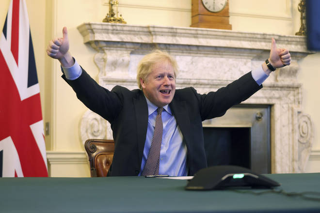 Boris Johnson reacts after Britain and the European Union reached a deal