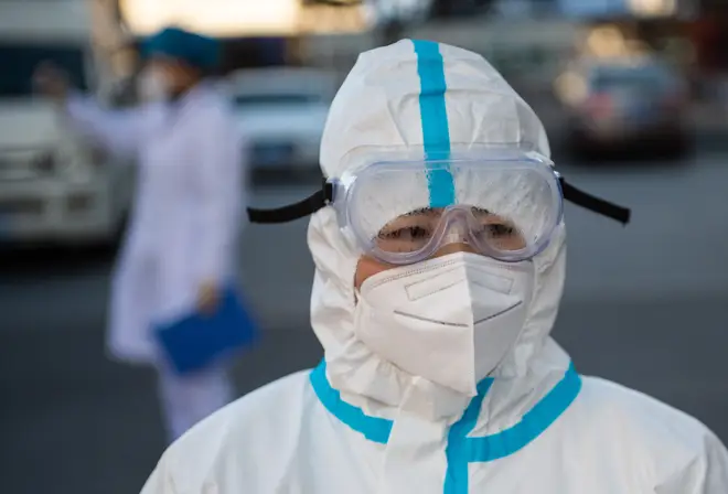 A medical worker is seen in the Shunyi District of Beijing