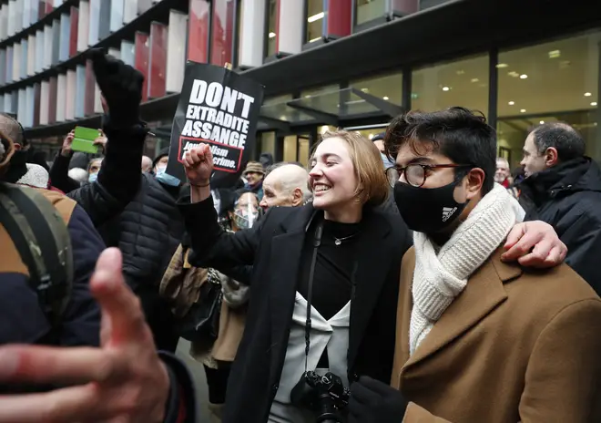 Julian Assange supporters celebrate the judge's extradition ruling