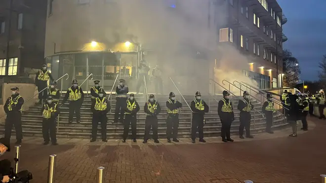 A line of police officers formed a line outside Cardiff Bay Police Station