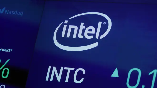 The symbol for Intel appears on a screen at the Nasdaq MarketSite, in New York (Richard Drew/AP)