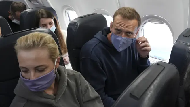 Leading Kremlin critic Alexei Navalny flew home to Russia on Sunday after recovering in Germany from his poisoning in August with a nerve agent