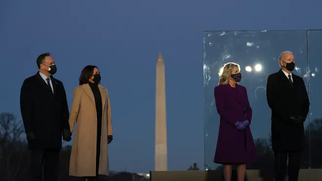 Joe Biden, Kamala Harris and their spouses gather for a Covid-19 memorial upon their arrival into Washington DC