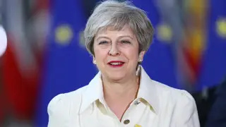 Theresa May said the UK was well placed to play a decisive role in shaping a more cooperative world