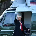 President Donald Trump leaves the White House for the last time
