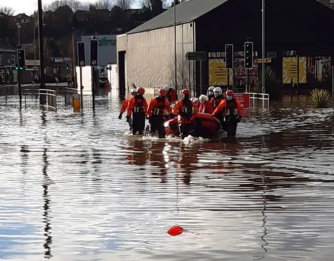 Emergency services evacuating retirement village Weaver Court in Northwich