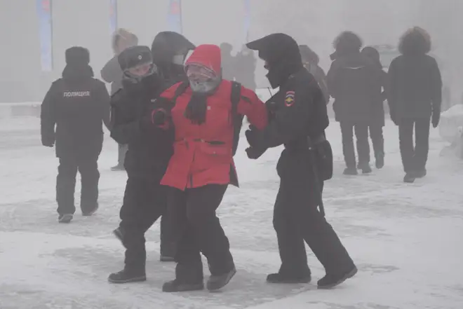Police officers detain a participant in an unauthorized rally in support of Russian opposition activist Alexei Navalny near Ordzhonikidze Square in Yakutsk.