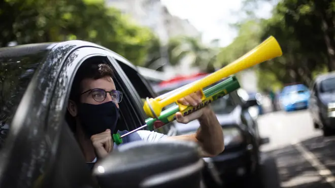 Virus Outbreak Brazil Protest