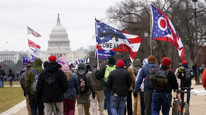 Supporters of former president Donald Trump marching towards the Capitol on January 6