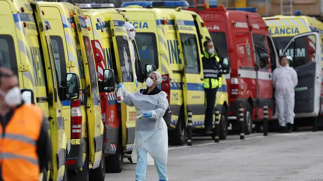 Ambulances queue outside a hospital in Lisbon
