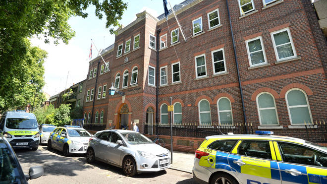 A barber was invited into Bethnal Green police station