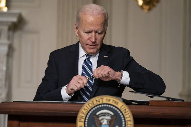 President Joe Biden signs a series of executive orders on climate change