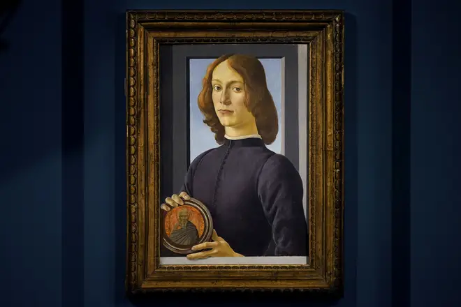 Sandro Botticelli's Young Man Holding a Roundel is displayed at Sotheby's in New York