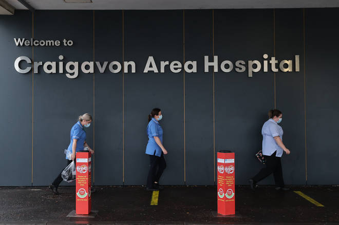 File photo: Healthcare workers walking towards the main entrance of Craigavon Area Hospital