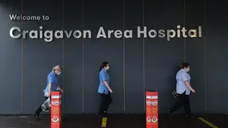File photo: Healthcare workers walking towards the main entrance of Craigavon Area Hospital