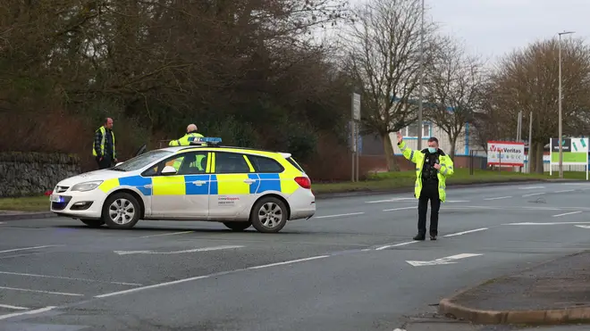Police cordons on Abbey Road outside the Wrexham Industrial Estate near the Wockhardt site