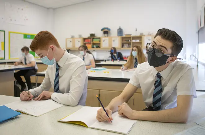 S4 pupils at St Columba's High School in Gourock, Inverclyde, wear protective face masks during their chemistry lesson