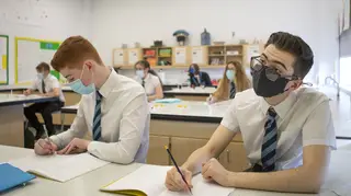 S4 pupils at St Columba's High School in Gourock, Inverclyde, wear protective face masks during their chemistry lesson