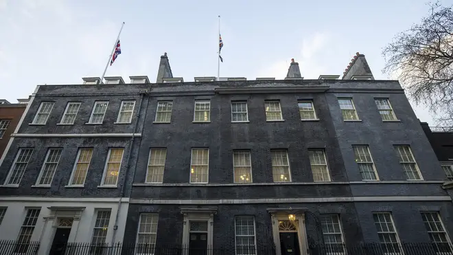 Flags are flown at half-mast outside Downing Street following the death of Sir Tom
