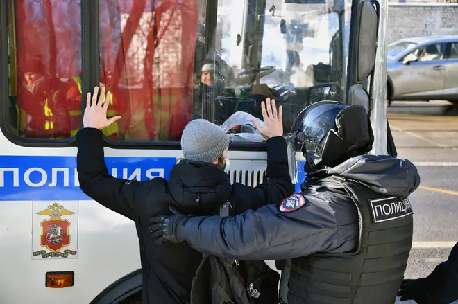 Protesters were confronted by heavily-armoured police officers in Moscow