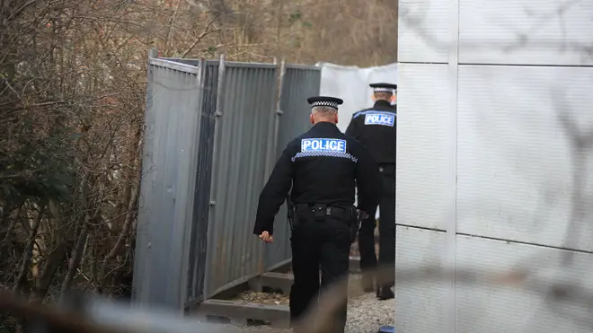 Police raid: Officers in Merseyside (file image)