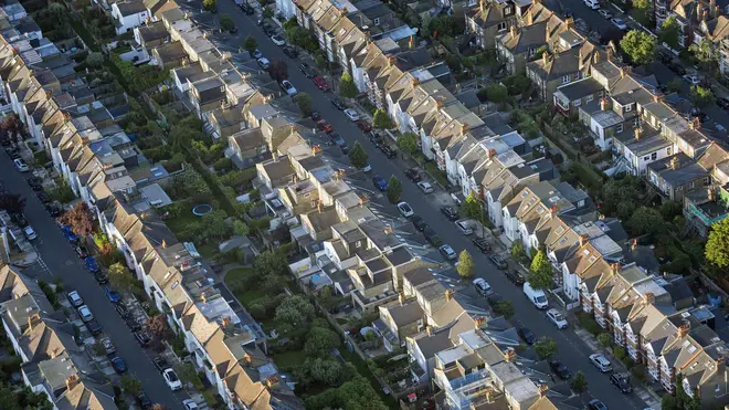 An aerial view of rows of houses