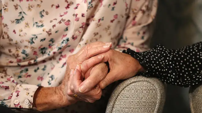 The minister said she hopes people can "hold hands with relatives" in care homes soon